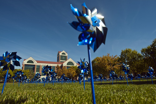 Chris Detrick  |  The Salt Lake Tribune
A field of 610 pinwheels outside of Sandy City Hall Tuesday October 9, 2012, represent the 610 children that witnessed domestic violence in Sandy last year. October is National Domestic Violence Awareness month.