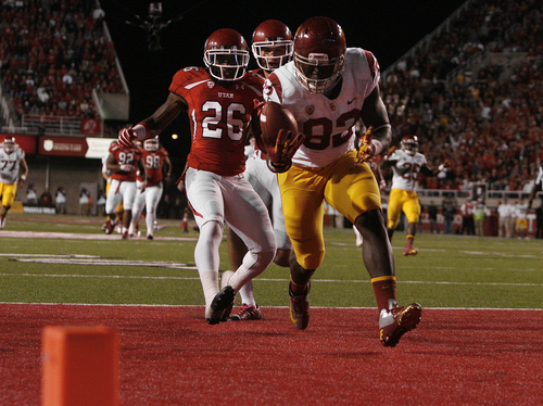 Scott Sommerdorf  |  The Salt Lake Tribune             
USC tight end Randall Telfer (82) scores a 23-yard touchdown with Utah defensive back Ryan Lacy (26) trailing the play on Oct. 4, 2012.