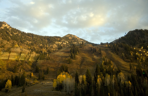 Kim Raff | The Salt Lake Tribune
The sun sets over the mountains in a view from the dining room of The Aerie restaurant at Snowbird Ski & Summer Resort on Oct. 4, 2012.