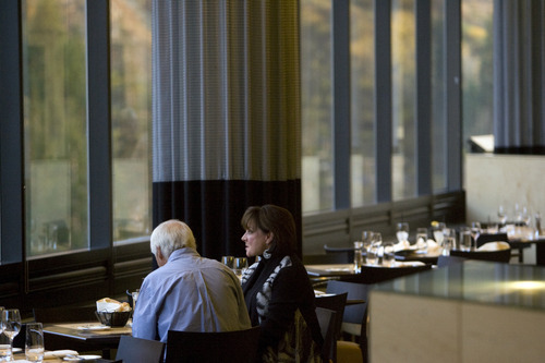Kim Raff | The Salt Lake Tribune
Walt and Marcia Klement eat dinner at The Aerie restaurant at Snowbird's Cliff Lodge on Oct. 4, 2012.