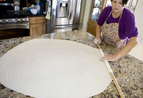 Keith Johnson  |  The Salt Lake Tribune

Munira Causevic prepares Bosnian pita at her son's home in Sandy.
