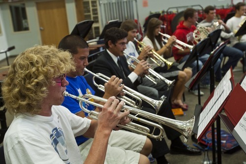 Chris Detrick  |  The Salt Lake Tribune
Spencer Wright and other members of the Wind Symphony perform during a rehearsal at American Fork High School Wednesday Oct. 10, 2012. The symphony, along with the University of Utah Wind Ensemble, will perform a special concert in honor of Heather Christensen on Oct. 23 on the university's campus.