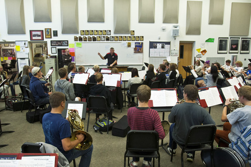 Chris Detrick  |  The Salt Lake Tribune
John Miller conducts members of the Wind Symphony during a rehearsal at American Fork High School Wednesday Oct. 10, 2012. The symphony, along with the University of Utah Wind Ensemble, will perform a special concert in honor of Heather Christensen on Oct. 23 on the university's campus.