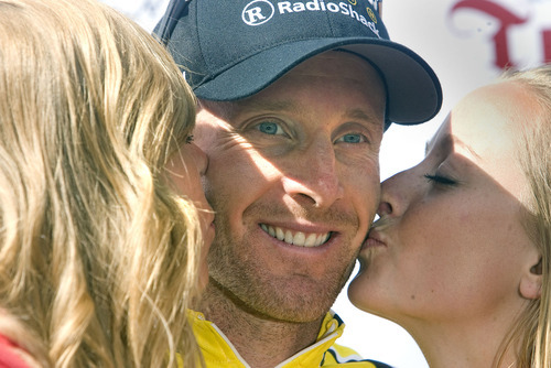 Al Hartmann  |  Salt Lake Tribune
Levi Leipheimer gets the traditional kiss upon leaving the podium after winning the Tour of Utah which finished its final stage Sunday at Snowbird.