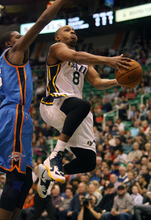 Steve Griffin | The Salt Lake Tribune


Utah's Randy Foye glides to the basket during first half action in the Jazz Thunder preseason game and EnergySolutions Arena in Salt Lake City, Utah Friday October 12, 2012.