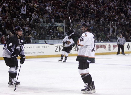 Kim Raff | The Salt Lake Tribune
Utah Grizzlies player Paul McIlveen celebrates scoring a goal against the Idaho Steelheads during the Grizzlies home opener at the Maverick Center in West Valley City, Utah on October 13, 2012.