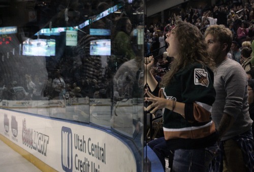 Kim Raff | The Salt Lake Tribune
Utah Grizzlies fan Mistie Anderson cheers when Paul McIlveen scores a goal against the Idaho Steelheads during the Grizzlies home opener at the Maverick Center in West Valley City, Utah on October 13, 2012.