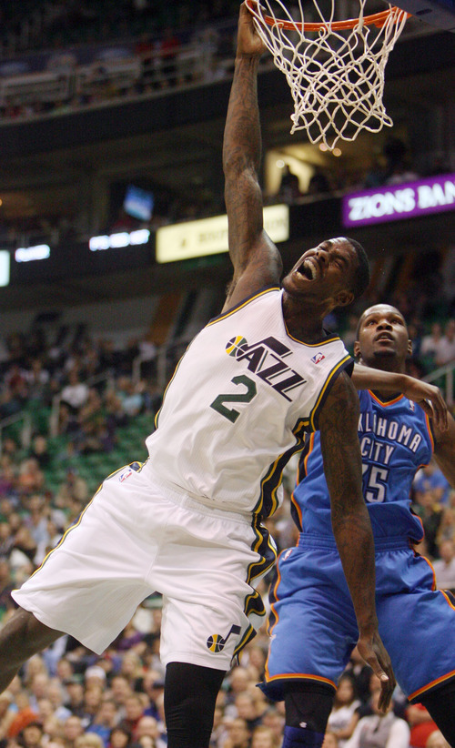 Steve Griffin | The Salt Lake Tribune


Utah's Marvin Williams reacts after being fouled by the Thunder's Kevin Durant on his way to a dunk during first half action in the Jazz Thunder preseason game and EnergySolutions Arena in Salt Lake City, Utah Friday October 12, 2012.