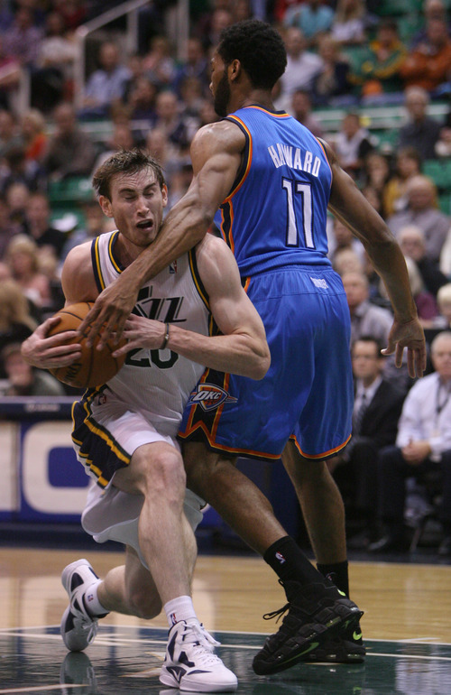 Steve Griffin | The Salt Lake Tribune


Utah's Gordon Hayward powers past the Thunder's Lazar Hayward picking up a foul during second half action in the Jazz Thunder preseason game and EnergySolutions Arena in Salt Lake City, Utah Friday October 12, 2012.