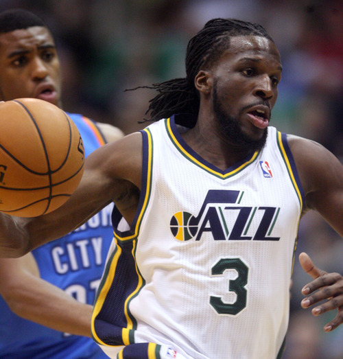 Steve Griffin | The Salt Lake Tribune


Utah's Demarre Carroll drives into the lane during second half action in the Jazz Thunder preseason game and EnergySolutions Arena in Salt Lake City, Utah Friday October 12, 2012.