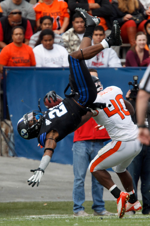 Trent Nelson  |  The Salt Lake Tribune
BYU's Jamaal Williams flips in the first quarter as BYU hosts Oregon State college football Saturday October 13, 2012 in Provo, Utah. Oregon State's Michael Doctor defending.