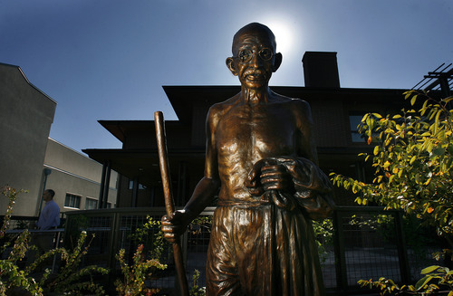 Scott Sommerdorf  |  The Salt Lake Tribune             
A statue of Mahatma Ghandi stands outside the YWCA center at 310 E. 300 South in Salt Lake City. The YWCA announced a new $900K grant to help pay for more police and prosecutor time to combat domestic violence, Monday, October 15, 2012.