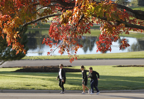 Al Hartmann  |  The Salt Lake Tribune
Runners excercise in  Sugarhouse Park in Salt Lake City on Monday, Oct. 15 as fall colors begin to make their appearance in the Salt Lake Valley.