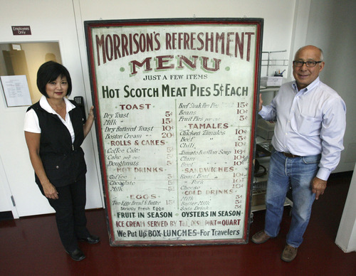 Steve Griffin | The Salt Lake Tribune
Susan and Gene Tafoya with an original Morrison Meat Pies menu at the company's new building in West Jordan, Utah Thursday September 20, 2012. being made. The Tafoya's are owners of the company.