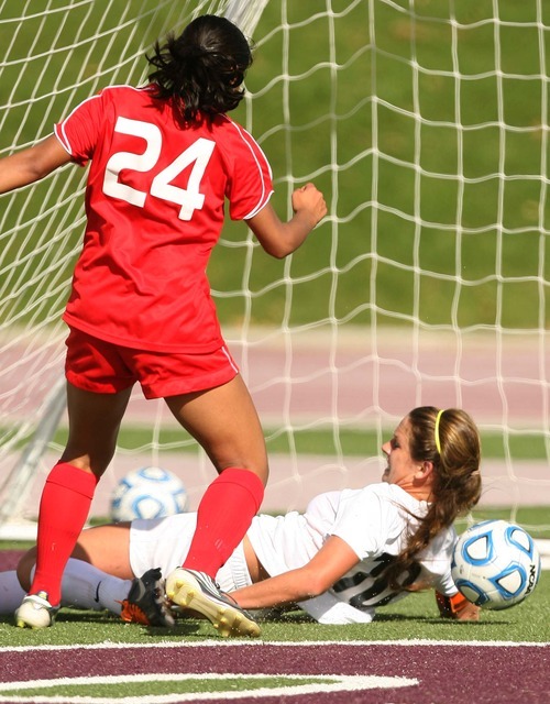 Leah Hogsten  |  The Salt Lake Tribune
 Ogden's Avery Calton flies towards the net in an attempt to score in the final minutes of the game.  Park City High School soccer team defeated Ogden High School girls soccer team 1-0 during the 3A State Semifinal Championship game Friday, October 19, 2012 at Jordan High School.