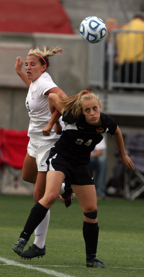 Kim Raff | The Salt Lake Tribune
Alta Lindsey Butts and Viewmont player Karrie Pead battle for a head ball during the 5A girls state championship game at Rio Tinto Stadium in Sandy, Utah on October 19, 2012. Viewmont went on to win the game 1-0.