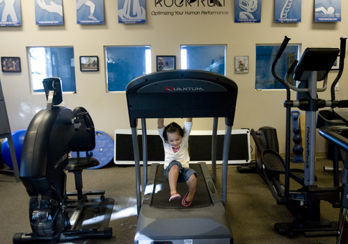 Kim Raff | The Salt Lake Tribune
Kiarah McCoy swings on a treadmill while undergoing physical therapy following surgery to rebuild her hip at Rock Run Physical Therapy & Rehab Specialists in Roy, Utah on October 10, 2012. The 4-year-old's hip dysplasia might have been easily fixed had it been caught earlier by her pediatrician. The last surgery, her third, is her mother Sarah McCoy's last hope for her daughter to regain mobility. But the family, though fully insured, is struggling to pay their medical bills.