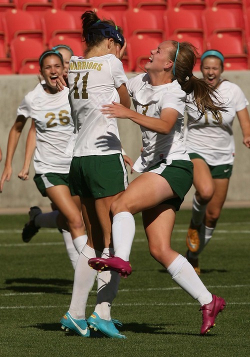 Leah Hogsten  |  The Salt Lake Tribune
Snow Canyon's Tirsa Snyder runs to congratulate Sarah Henderson on her scoring penalty kick. Snow Canyon High School girls defeated Park City High School soccer team 1-0 soccer team to win their first 3A State  Championship game Saturday, October 20, 2012 at Rio Tinto Stadium.
