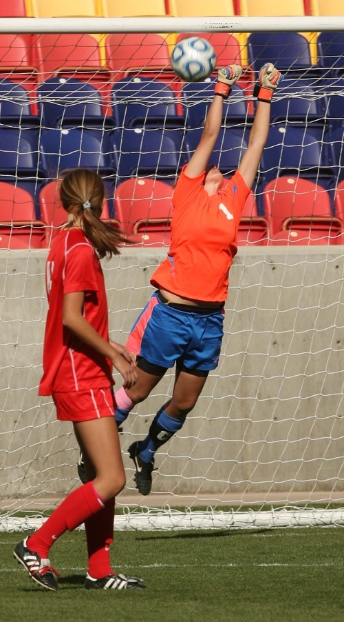Leah Hogsten  |  The Salt Lake Tribune
Park City's goalie Skye Mooney barely misses the penalty kick that seized the game for Snow Canyon. Snow Canyon High School girls defeated Park City High School soccer team 1-0 soccer team to win their first 3A State  Championship game Saturday, October 20, 2012 at Rio Tinto Stadium.