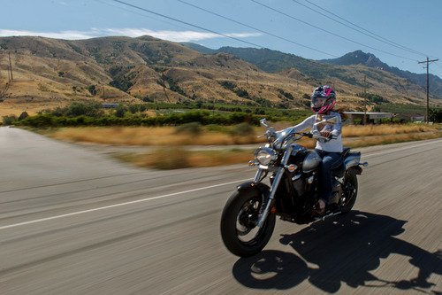 Trent Nelson  |  The Salt Lake Tribune
Jen Comer joins a July motorcycle ride in Ogden to raise money for Weber County Sheriff Terry Thompson and Cache County Sheriff G. Lynn Nelson.