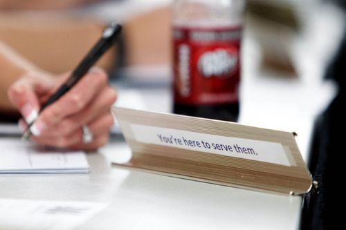 Trent Nelson  |  The Salt Lake Tribune
A note on the back of Jen Comer's student senate name tag reads, 