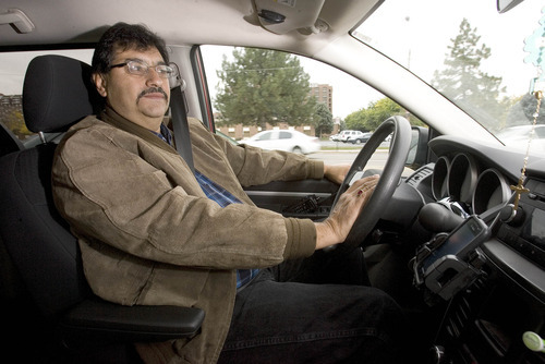 Paul Fraughton | The Salt Lake Tribune
Raul Ramirez sits behind the wheel of his taxi. The owner of Utah Eagle Transport, Ramirez will be taking voters to the polls.
 Tuesday, October 23, 2012