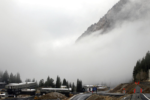 Al Hartmann  |  The Salt Lake Tribune
Storm clouds are socked in above Alta Lodge at the top of Little Cottonwood Canyon on Tuesday, Oct. 23.   The higher peaks received a skiff of snow from last night's storm.