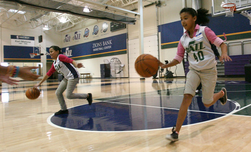 Steve Griffin | The Salt Lake Tribune

Students from the U.S. Dream Academy run through dribbling drills during a private basketball clinic the Utah Jazz held for at-risk youth. About 55 children ages 8 to 14 attended the event at the Zions Bank Basketball Center in Salt Lake City on Wednesday, Oct. 24, 2012.