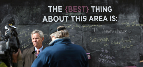 Steve Griffin | The Salt Lake Tribune
Salt Lake City Mayor Ralph Becker stands in front of one of three, 8-foot chalkboards have been erected on Regent Street between 100 and 200 South in Salt Lake City, asking the public to complete the following sentences: -I hope the new Performing Arts Center will… -A great arts district includes… -The best thing about this area is…  It is the site of an urban intervention exercise aimed at gathering input on the new Utah Performing Arts Center and the changes it will bring to downtown. All of the responses posted on the boards are being gathered and included in a widespread public engagement effort that will inform and shape upcoming decisions about the city's new performing arts venue.  Wednesday October 24, 2012.