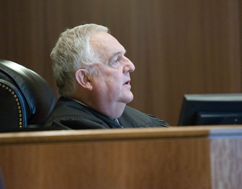 Paul Fraughton | The Salt Lake Tribune
Judge Donald Eyre pronounces sentence on Roberto Roman who was acquitted for the murder of Millard County Deputy Josie Fox, but was found guilty of tampering with evidence and possession of a dangerous weapon by a restricted person.
 Wednesday, October 24, 2012