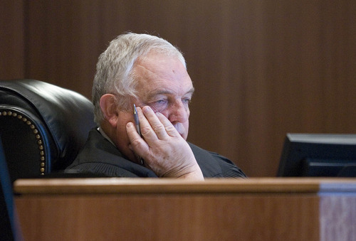 Paul Fraughton | The Salt Lake Tribune
Judge Donald Eyre listens to attorneys before sentencing Roberto Roman. Roman was acquitted of the murder of Millard County Deputy Josie Fox, but was found guilty of tampering with evidence and possession of a dangerous weapon by a restricted person.
 Wednesday, October 24, 2012