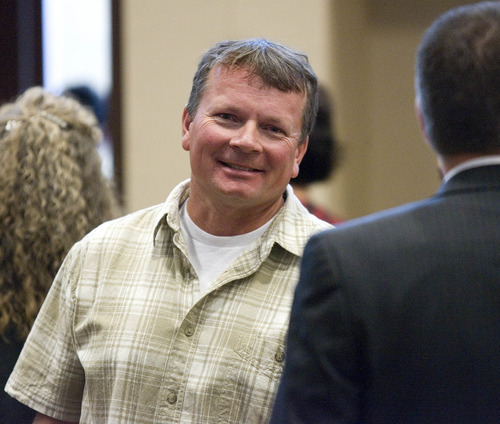 Paul Fraughton | The Salt Lake Tribune
After the sentencing of Roberto Roman, Douglas Fox, husband of Josie Fox, manages to smile. Roman was acquitted of the murder of Millard County Deputy Josie Fox, but was found guilty of tampering with evidence and possession of a dangerous weapon by a restricted person.
 Wednesday, October 24, 2012