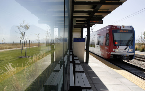 Francisco Kjolseth  |  The Salt Lake Tribune
Passengers ride the Red Line of TRAX that ends at Daybreak.