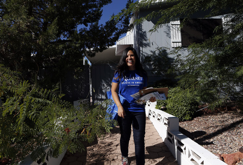 Utah republican Linda Patiño canvases homes in Boulder City, Nev. on Saturday, Oct. 20, 2012. (Isaac Brekken for the Salt Lake Tribune)