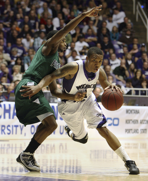 Steve Griffin  |  The Salt Lake Tribune

Ogden -  Weber State's Damian Lillard drives past Portland State's Melvin Jones  during semifinal game of the Big Sky Tournament at the Dee Events Center in Ogden between Weber State and Portland State Tuesday Mar 9, 2010.