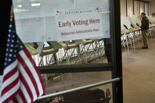 Chris Detrick  |  The Salt Lake Tribune
Residents vote early at the Salt Lake County Government Center on Tuesday. Early voting runs through Nov. 2.