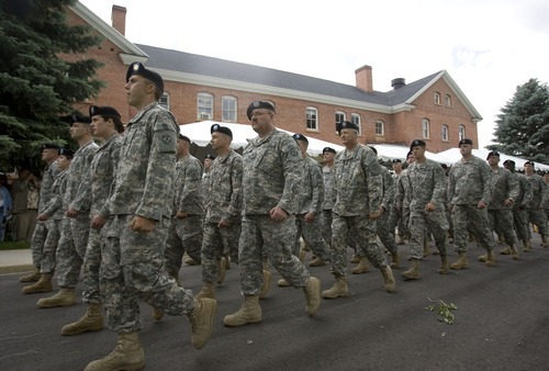 Tribune file photo
Soldiers of the 96th Regional Readiness Command, which has since been shut down, march in October 2010 to the parade grounds at Fort Douglas.
