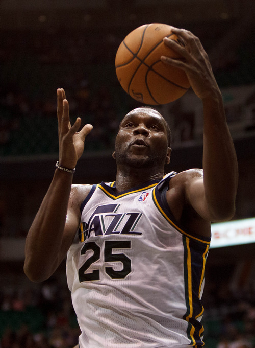 Trent Nelson  |  The Salt Lake Tribune
Utah Jazz center/forward Al Jefferson grabs a rebound as the Utah Jazz host the Portland Trailblazers in preseason NBA basketball on Oct. 25, 2012 at EnergySolutions Arena in Salt Lake City. It is unknown if Jefferson and seven other players with expiring contracts on the Jazz roster will return in 2013-14 or whether the Jazz will opt for the cap space and build around young players.
