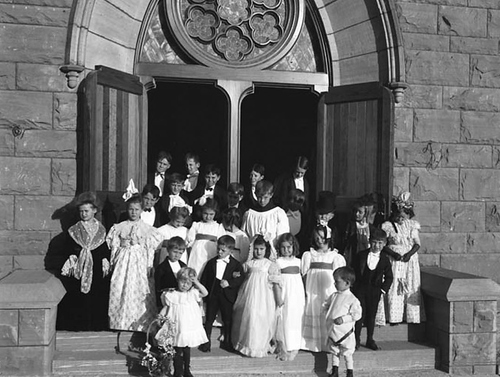 Photo Courtesy Utah State Historical Society

 Image shows a group of children in front of the First Presbyterian Church in Salt Lake City. The children had a 