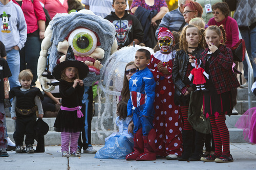 Chris Detrick  |  The Salt Lake Tribune
Kids in various Halloween costumes participate in the costume contest during the Monster Block Party at the Gallivan Center Saturday October 27, 2012.