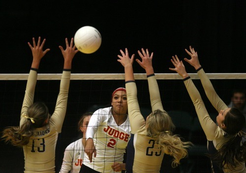 Kim Raff | The Salt Lake Tribune
Snow Canyon players Alexsa Parker and Jordan Gines try and block the ball as Judge Memorial player Makenzie King hits the ball over the net during the 3A state volleyball quarterfinal at the UCCU Center at Utah Valley University in Orem, Utah on October 26, 2012. Snow Canyon went on to win the match.