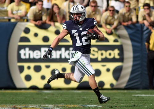Rick Egan  | The Salt Lake Tribune 

Brigham Young wide receiver JD Falslev (12) runs for a huge gain in yardage, for the cougars, in the second quarter, in football action BYU vs Georgia Tech, at Bobby Dodd Stadium in Atlanta, Saturday, October 27, 2012