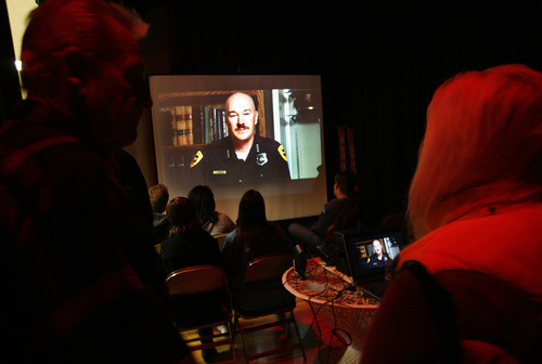 Scott Sommerdorf  |  The Salt Lake Tribune              
Volunteers watch a video during their orientation which ends with a thank you message from SLCPD Cheif Chris Burbank. Searchers then broke into groups to search for missing 80 year old Fritz Helland, Sunday, October 28, 2012.
