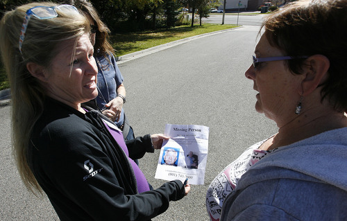 Scott Sommerdorf  |  The Salt Lake Tribune              
Searcher Elaine Gillespie, left, speaks with resident Margaret Robertson as volunteers search neighborhoods north of 4500 South near 1500 East for missing 80 year old Fritz Helland, Sunday, October 28, 2012.