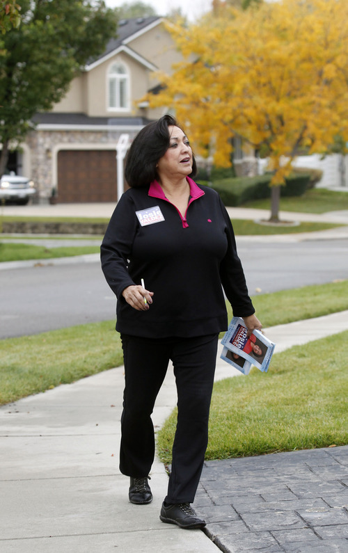 AAl Hartmann  |  The Salt Lake Tribune
 Josie Valdez, who's running for Utah Senate District 8 walks a neighborhood to meet her constituents in the district, which includes most of Cottonwood Heights, Midvale and Murray.