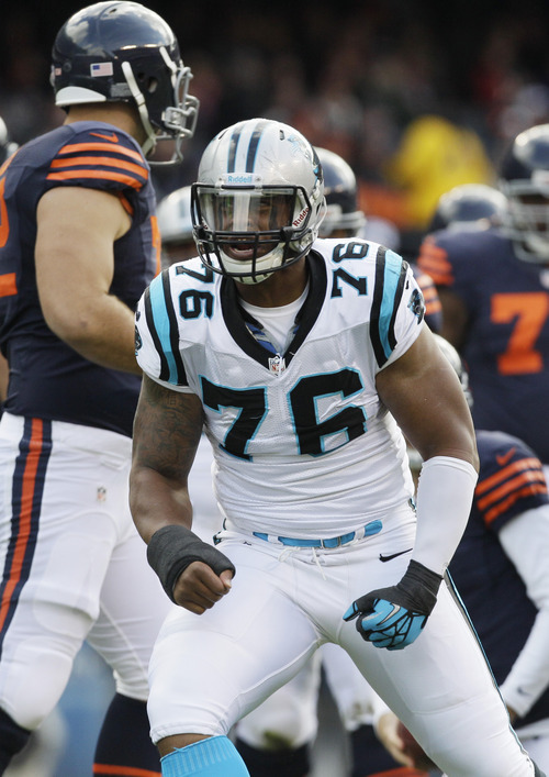 Carolina Panthers defensive end Greg Hardy (76) reacts after sacking Chicago Bears quarterback Jay Cutler in the first half of an NFL football game in Chicago, Sunday, Oct. 28, 2012. (AP Photo/Nam Y. Huh)