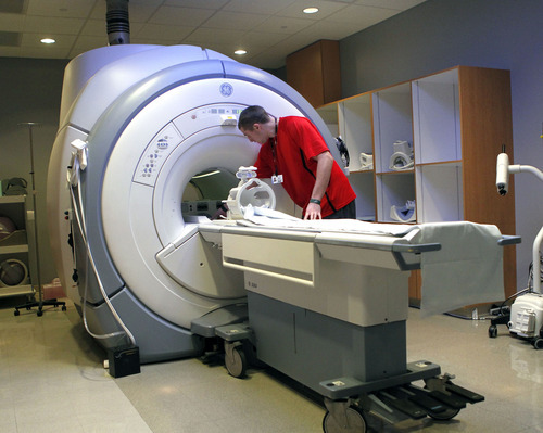 Al Hartmann  |  The Salt Lake Tribune
Will Fahrenbach, an MRI technician at Intermountain Helathcare prepares a machine for a patient. MRI systems are dependent on helium. Although the nation is experiencing a helium shortage, a spokesman for Intermountain Healthcare says hospital supplies are adequate.