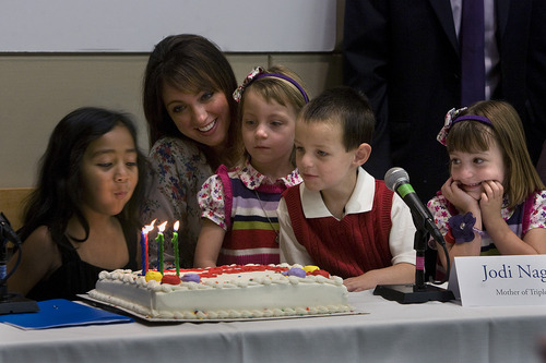 Scott Sommerdorf  |  The Salt Lake Tribune              
Five-year-old Selueni Toko blows out the candles on her birthday cake as Jodi Nagel and her triplets, Genessa, left, Connor and Natalia, right, watch. Five years to the day that Intermountain Medical Center opened, some of the hospital's very first patients returned to help staff celebrate the medical center's 5th anniversary, Monday, October 29, 2012.