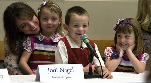 Scott Sommerdorf  |  The Salt Lake Tribune              
Jodi Nagel and her triplets, Genessa, left, Connor and Natalia, right. Five years to the day that Intermountain Medical Center opened, some of the hospital's very first patients returned to help staff celebrate the medical center's 5th anniversary, Monday, October 29, 2012.