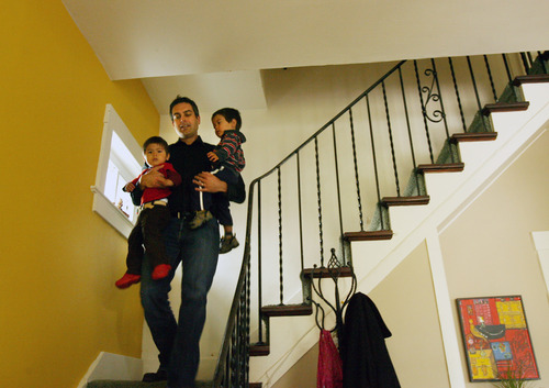 Steve Griffin | The Salt Lake Tribune


 Jason Hardink, Utah Symphony principal keyboardist and director of the NOVA Chamber Music Series, carries his twin sons, Luc (left) and Derek, downstairs in his Salt Lake City, Utah home Monday October 15, 2012.